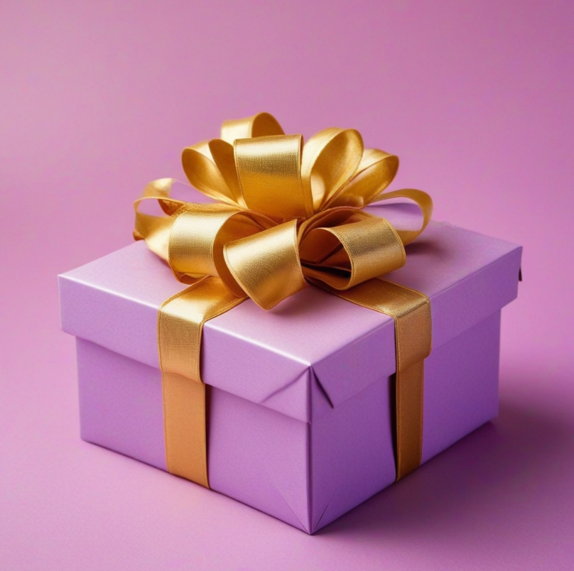 purple gift box with golden bow